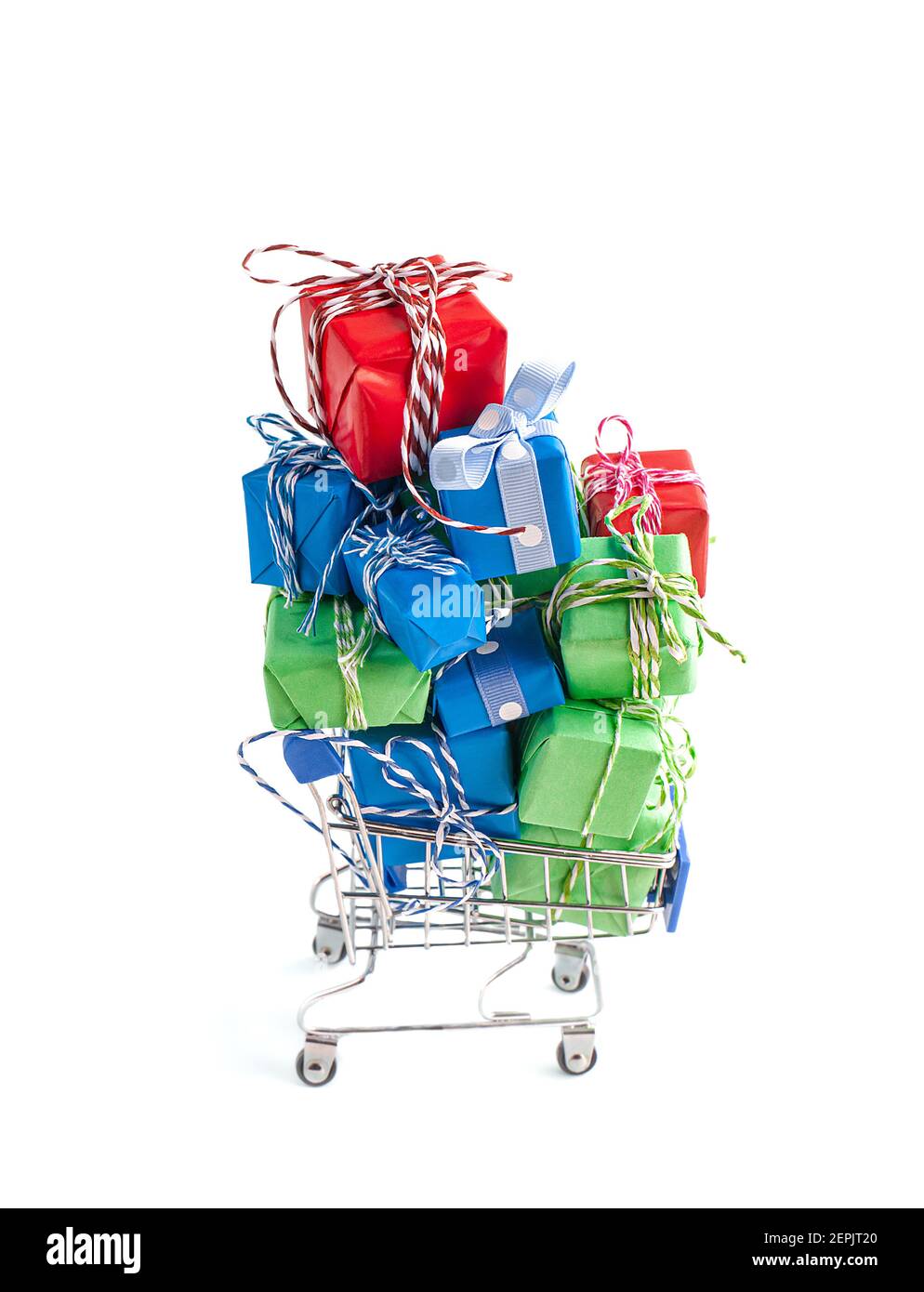 Trolley shopping cart filled with a lot of paper wrapped gift boxes on light background. Concept of online shopping, Christmas, presents for Valentine Day, Black Friday. CopySpace for text. Stock Photo