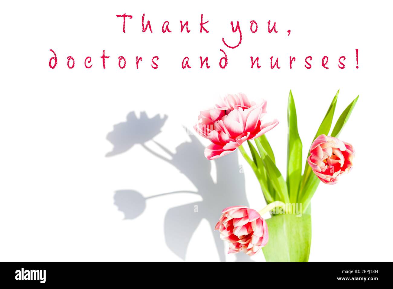 Bouquet of tulip flowers and text Thank you doctors and nurses on white