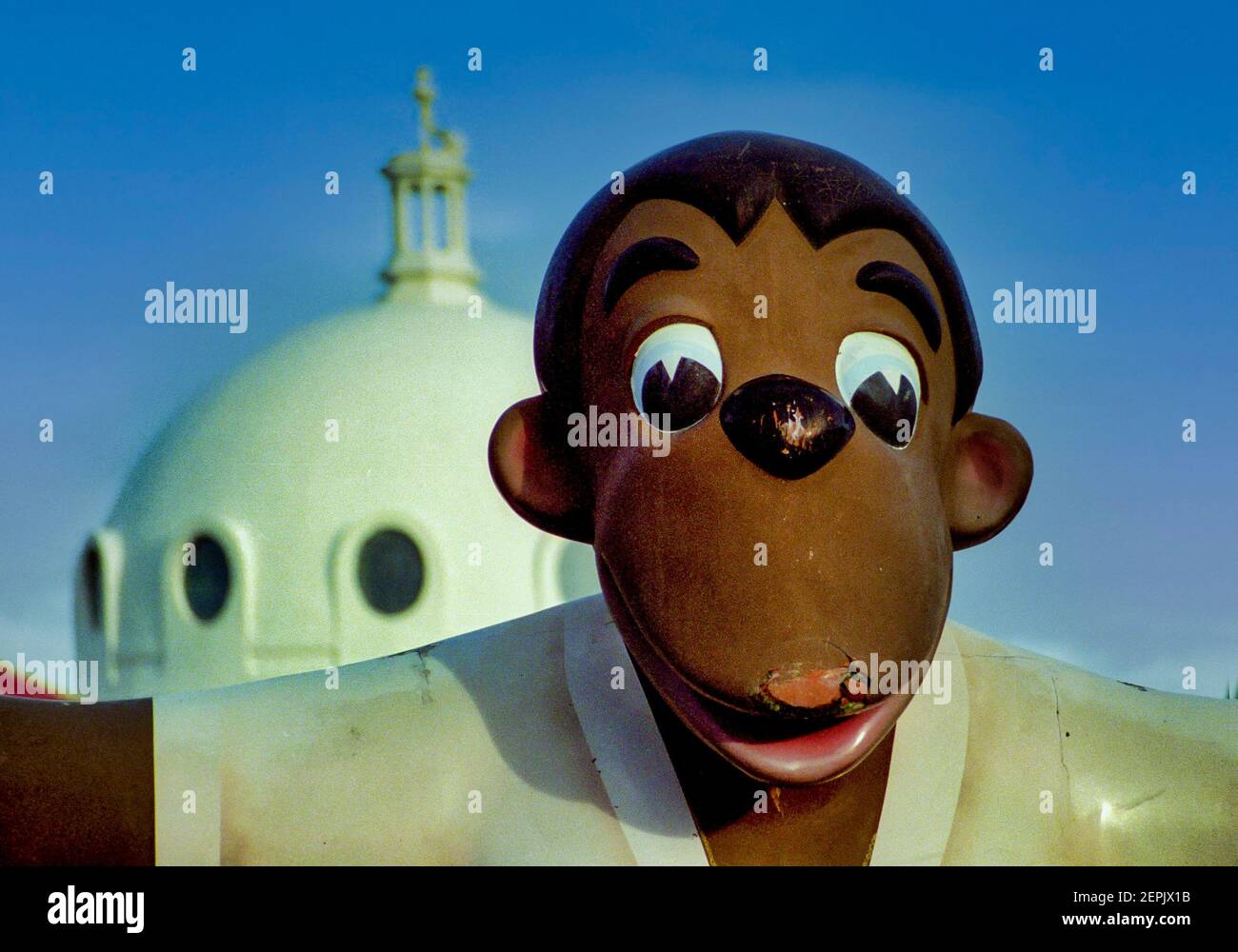 Cardboard cartoon character on top of a carnival ride in the Spanish City, in Whitley Bay, England. Stock Photo
