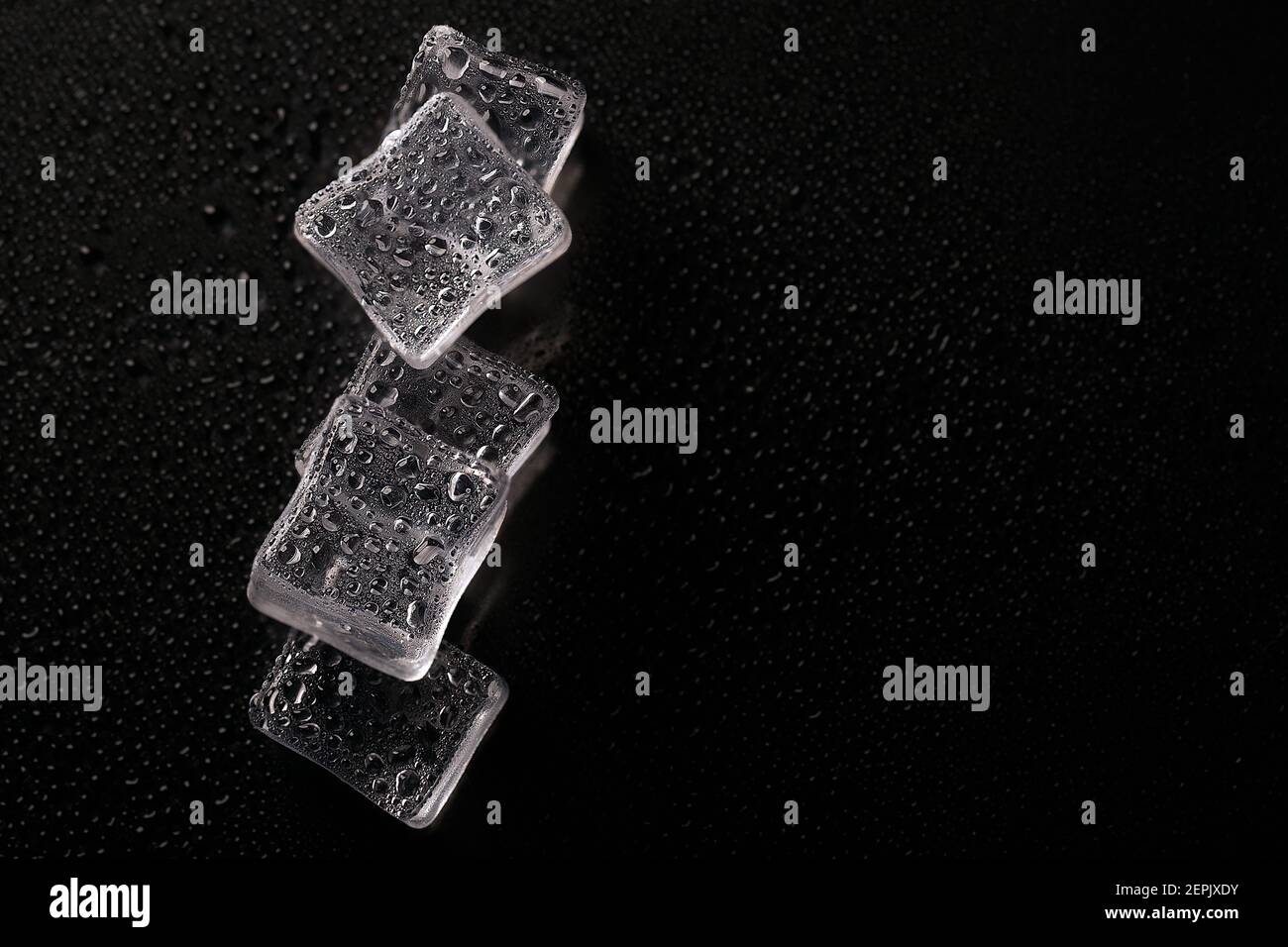 Abstract creative background with ice cubes and water drops. Stock Photo