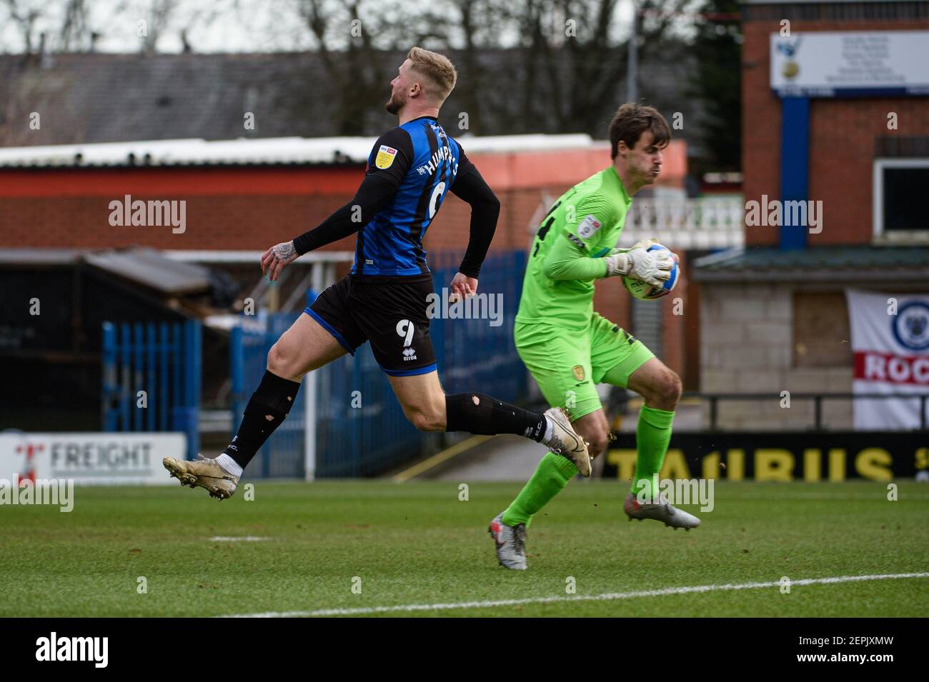 ROCHDALE, ENGLAND. FEB 27TH Keeper Ben Garratt of Burton Albion grabs the ball under pressure from Stephen Humphrys of Rochdale AFC during the Sky Bet League 1 match between Rochdale and Burton Albion at Spotland Stadium, Rochdale on Saturday 27th February 2021. (Credit: Ian Charles | MI News) Credit: MI News & Sport /Alamy Live News Stock Photo