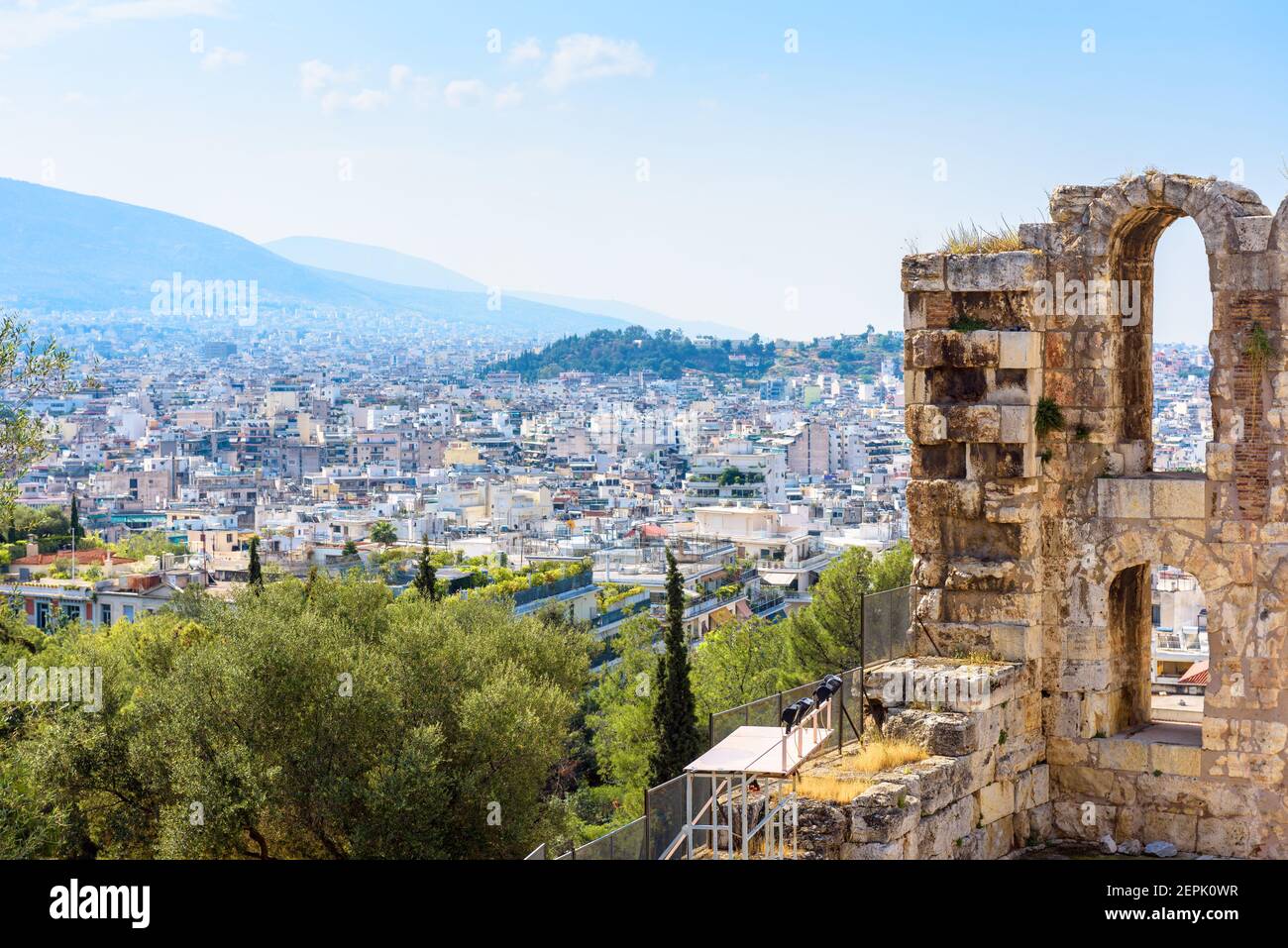 Athens skyline, Greece. View from Acropolis, ruins of Odeon of Herodes Atticus in foreground. This place is landmark of Athens. Urban landscape of Ath Stock Photo