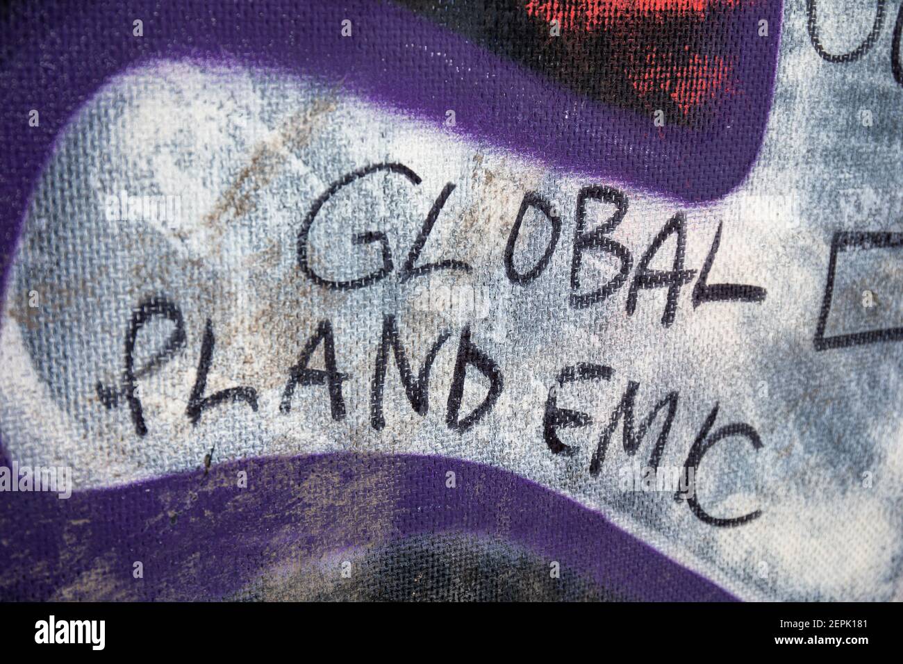 Global plandemic conspiracy theory writing on a wall in Munkkiniemi district of Helsinki, Finland Stock Photo