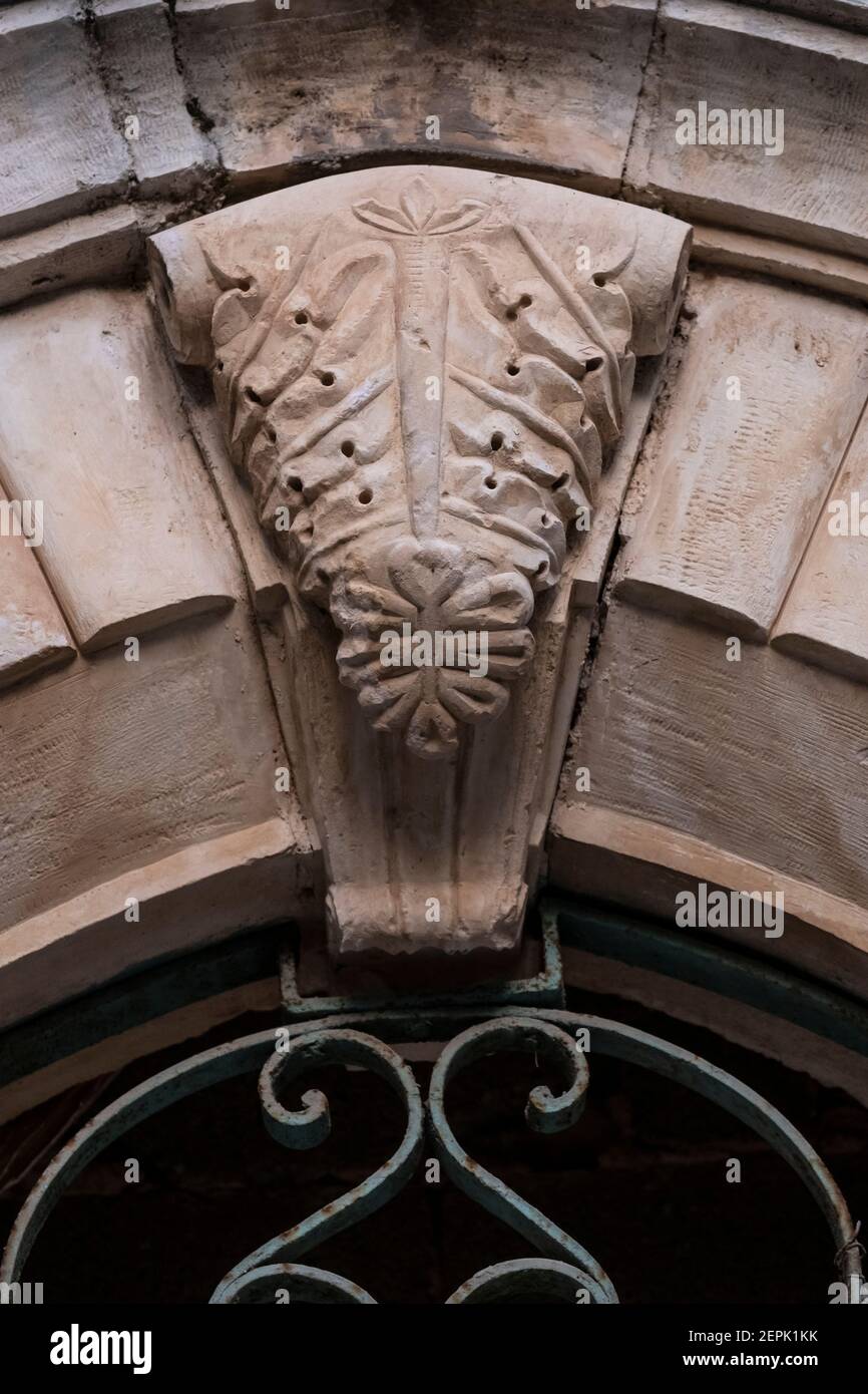 Decorative keystone in a doorway of an Arab house which was abandoned