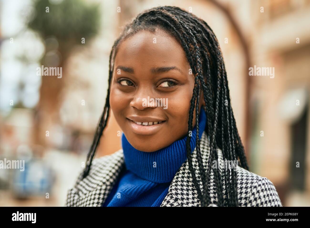 Young african american businesswoman smiling happy standing at the city ...