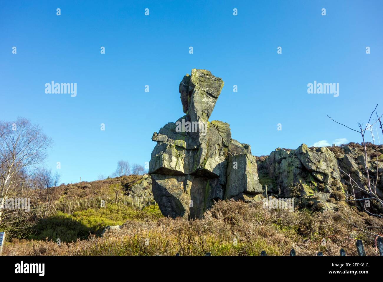 The Old Man of Mow is a gritstone pillar that can be found beside the path of the Gritstone Trail in the village of Mow Cop Cheshire England Stock Photo