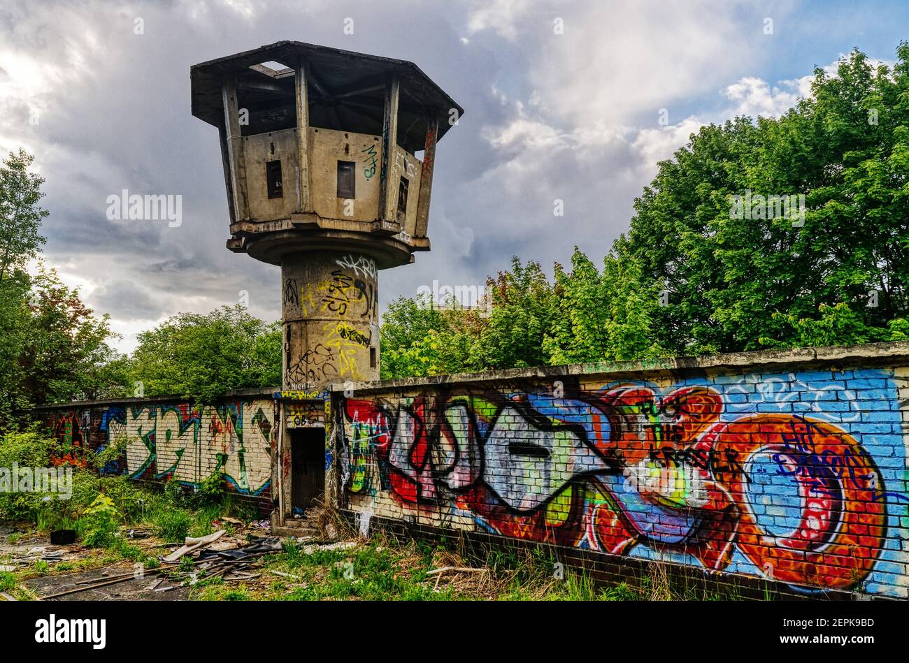 An abandoned and graffiti covered guard's watchtower in Berlin, Germany Stock Photo