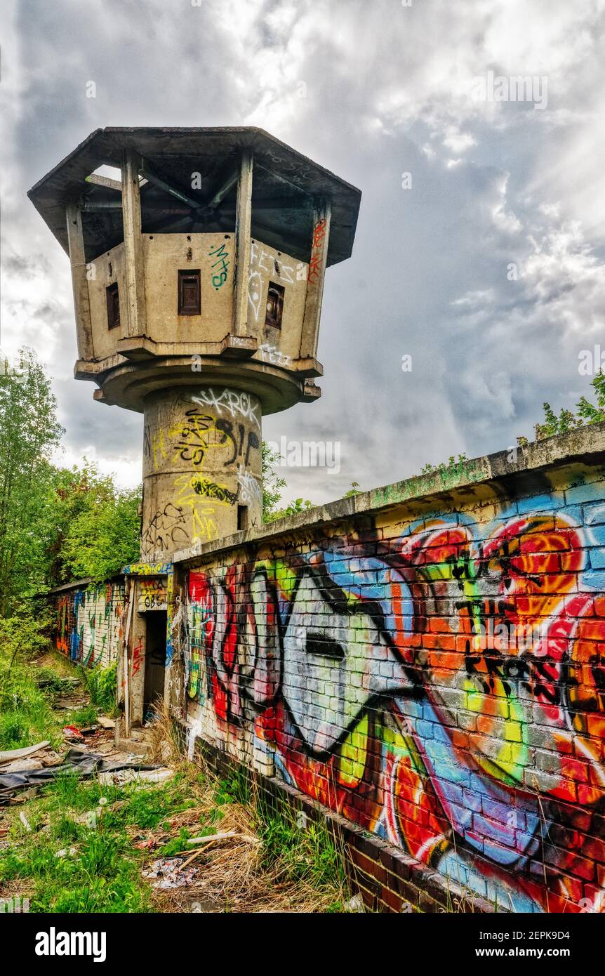 An abandoned and graffiti covered guard's watchtower in Berlin, Germany Stock Photo