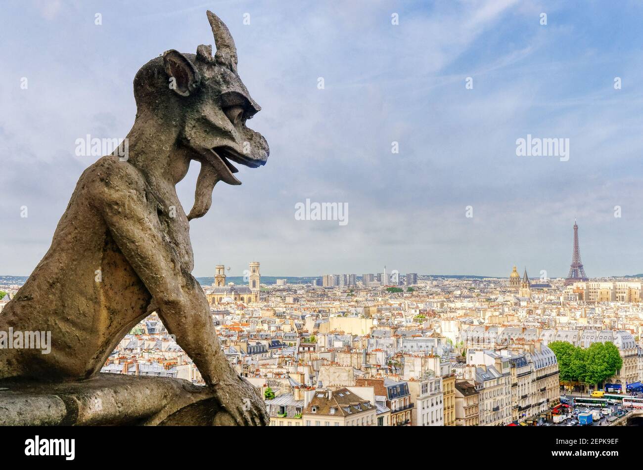 The view across Paris from the tower of Notre Dame de Paris with the gargoyles with the Eiffel Tower on the skyline Stock Photo