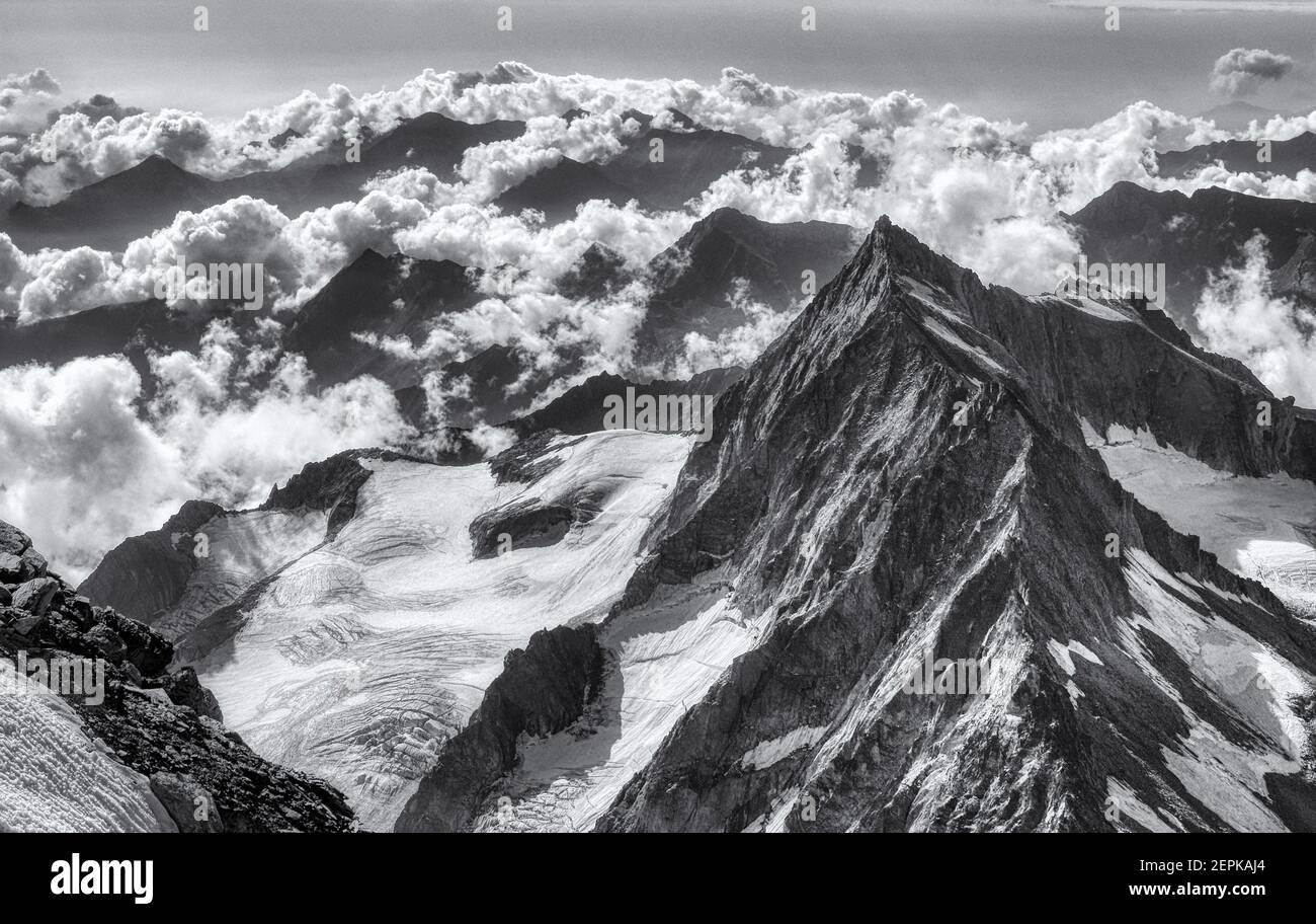 The Portjengrat (Pizzo d'Andolla) as seen from the summit of Weissmies in the Swiss Alps, Switzerland Stock Photo