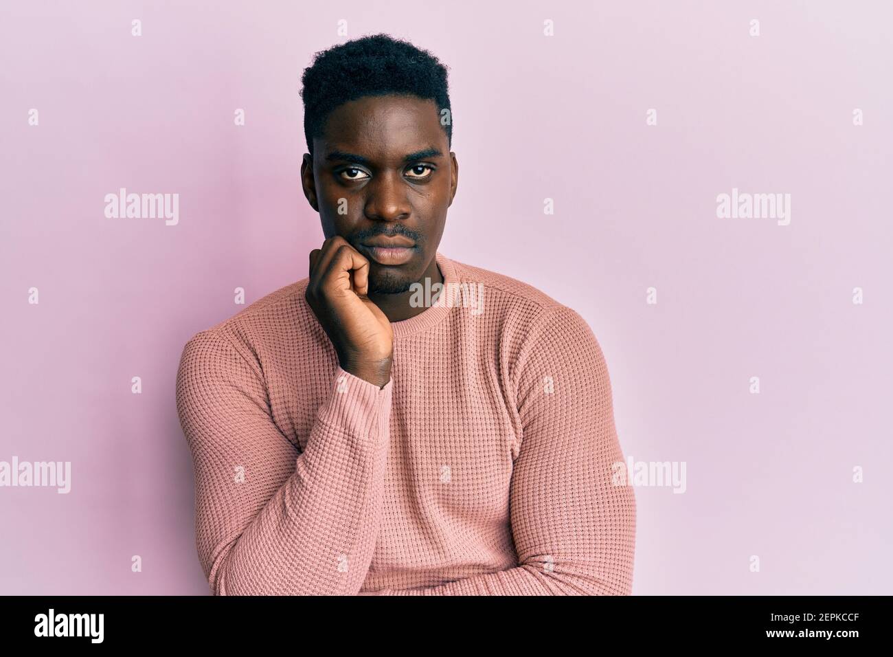 Handsome black man wearing casual clothes thinking looking tired and ...