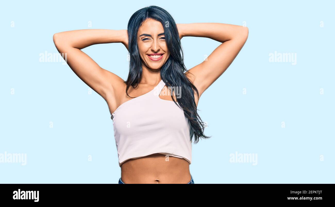 Indian woman stretching arm hi-res stock photography and images - Alamy