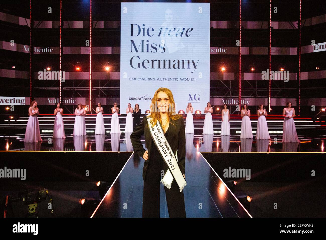Rust, Germany. 27th Feb, 2021. Anja Kallenbach, Miss Germany 2021 stands on stage shortly after her election. 16 candidates from all federal states faced the predominantly female jury for the election of Miss Germany 2021. The motto was #EmpoweringAuthenticWomen. According to the organizers, the competition should no longer be primarily about beauty, but about the ability to motivate others and send an individual message. Credit: Philipp von Ditfurth/dpa/Alamy Live News Stock Photo