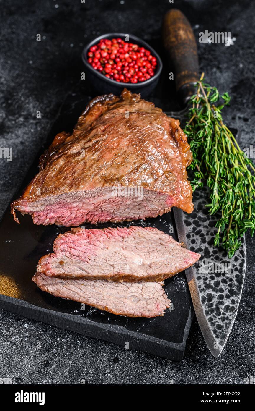 Roast beef tri tip steak bbq. Black background. Top view Stock Photo Alamy