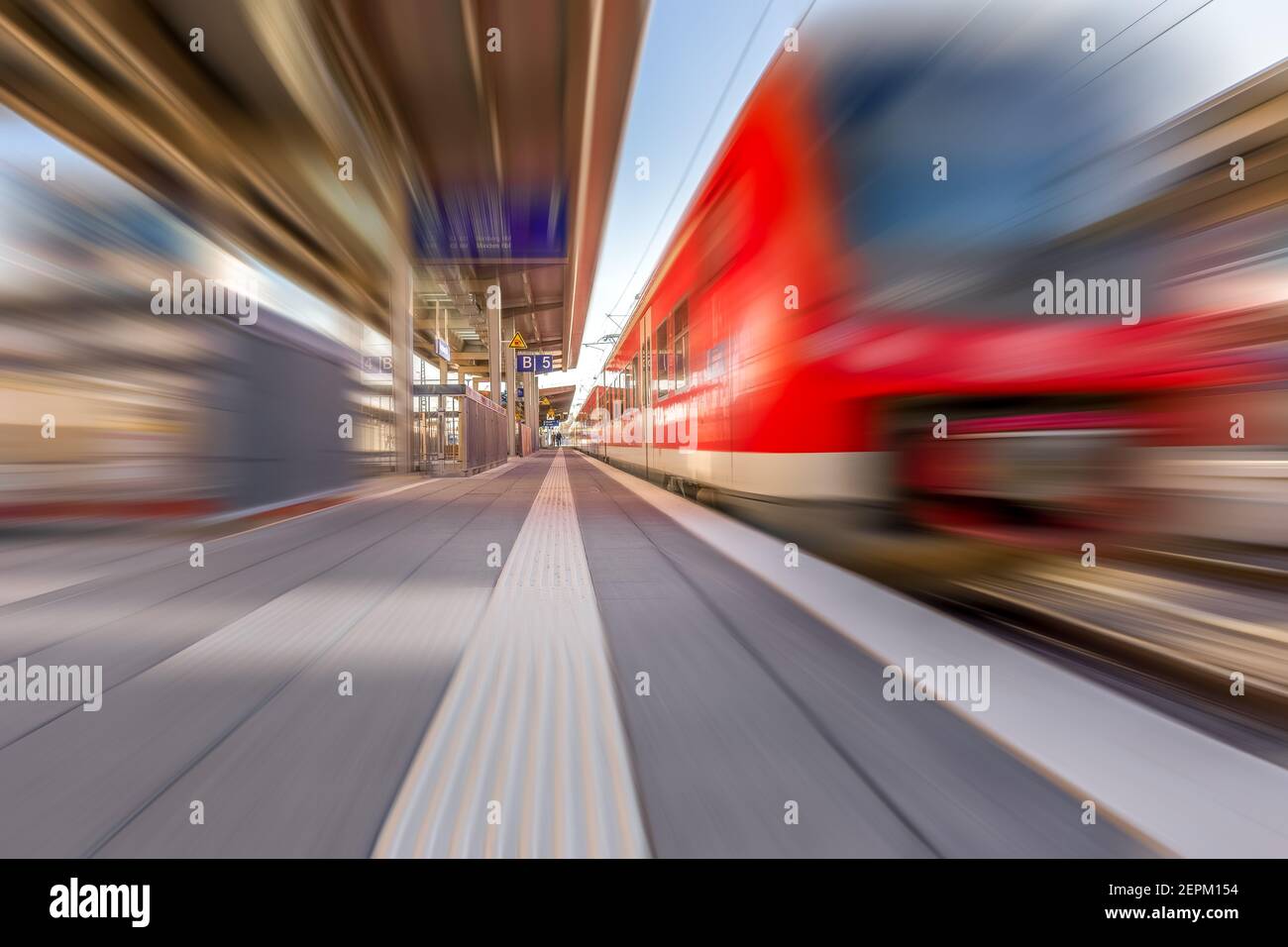 Fast moving train at station. Motion blur. Stock Photo