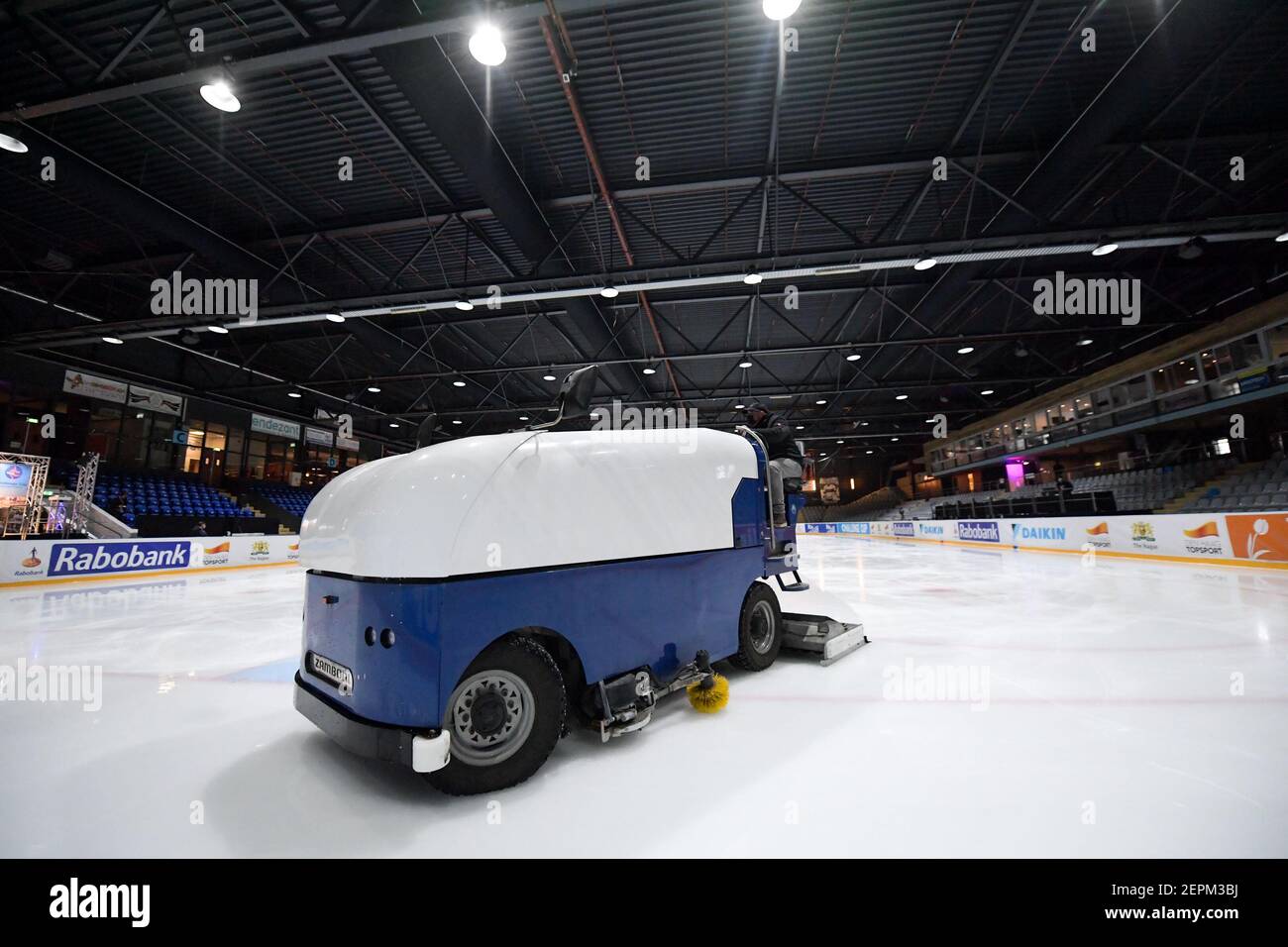 THE HAGUE, NETHERLANDS - FEBRUARY 27: An ice resurfacing machine cleans the ice during the Challenge Cup 2021 match between  and  at De Uithof on Febr Stock Photo