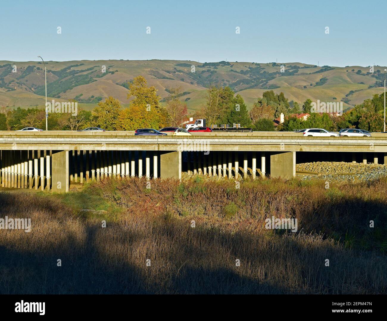 truck and autos on 880 overpass over Alameda Creek, California Stock Photo