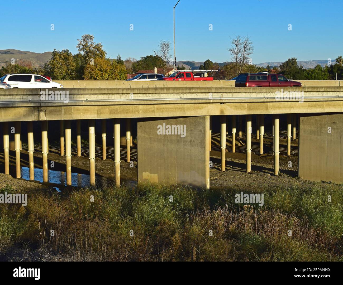truck and autos on 880 overpass over Alameda Creek, California Stock Photo