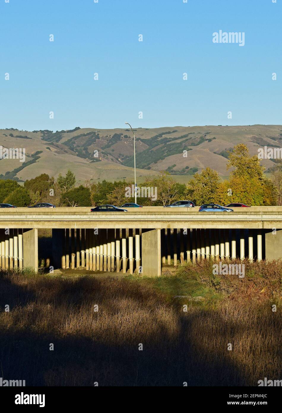 autos on 880 overpass over Alameda Creek, California Stock Photo