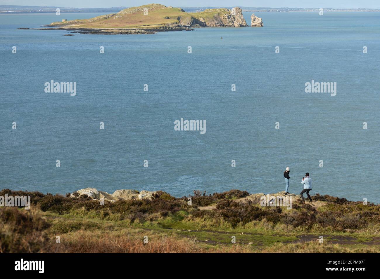 Dublin, Ireland. 26th Feb, 2021. A view of Ireland's Eye from Howth during sunset. Credit: SOPA Images Limited/Alamy Live News Stock Photo