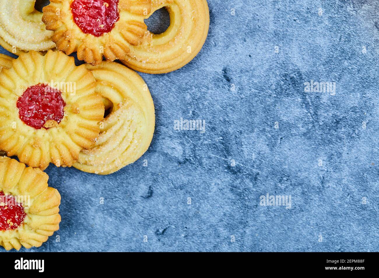 Assorted homemade biscuits on a blue background Stock Photo - Alamy