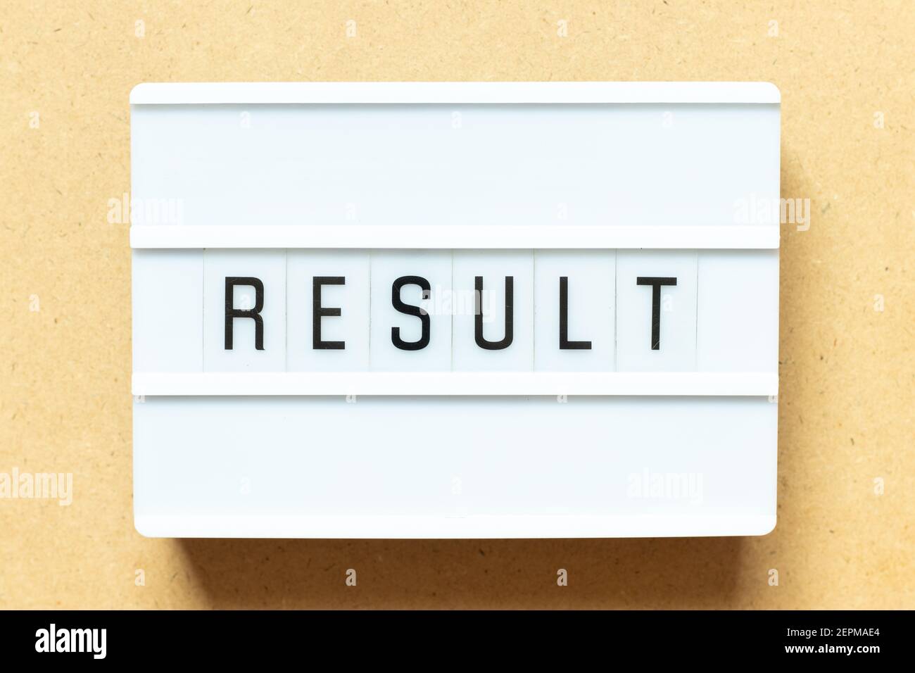 Lightbox with word result on wood background Stock Photo