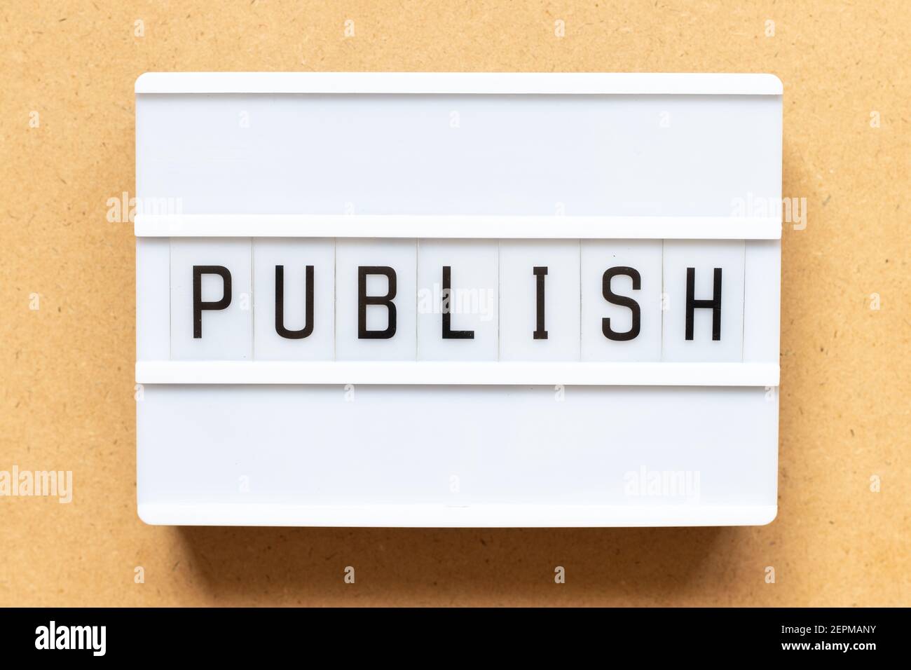 Lightbox with word publish on wood background Stock Photo