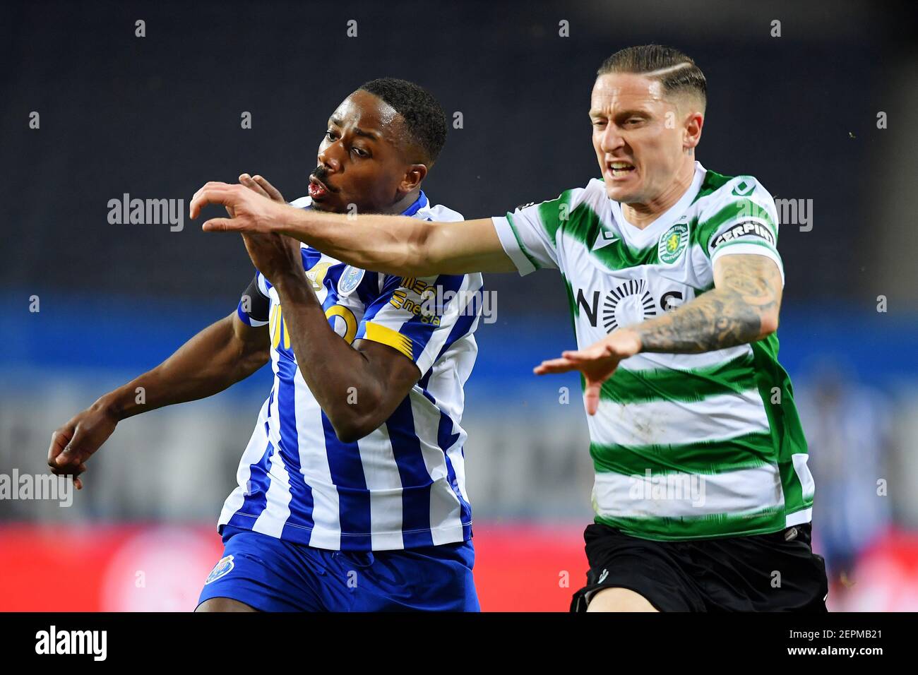 27th February 2021; Dragao Stadium, Porto, Portugal; Portuguese  Championship 2020/2021, FC Porto versus Sporting; Wilson Manafá of FC Porto  and Nuno Santos of Sporting tussle for the ball Stock Photo - Alamy