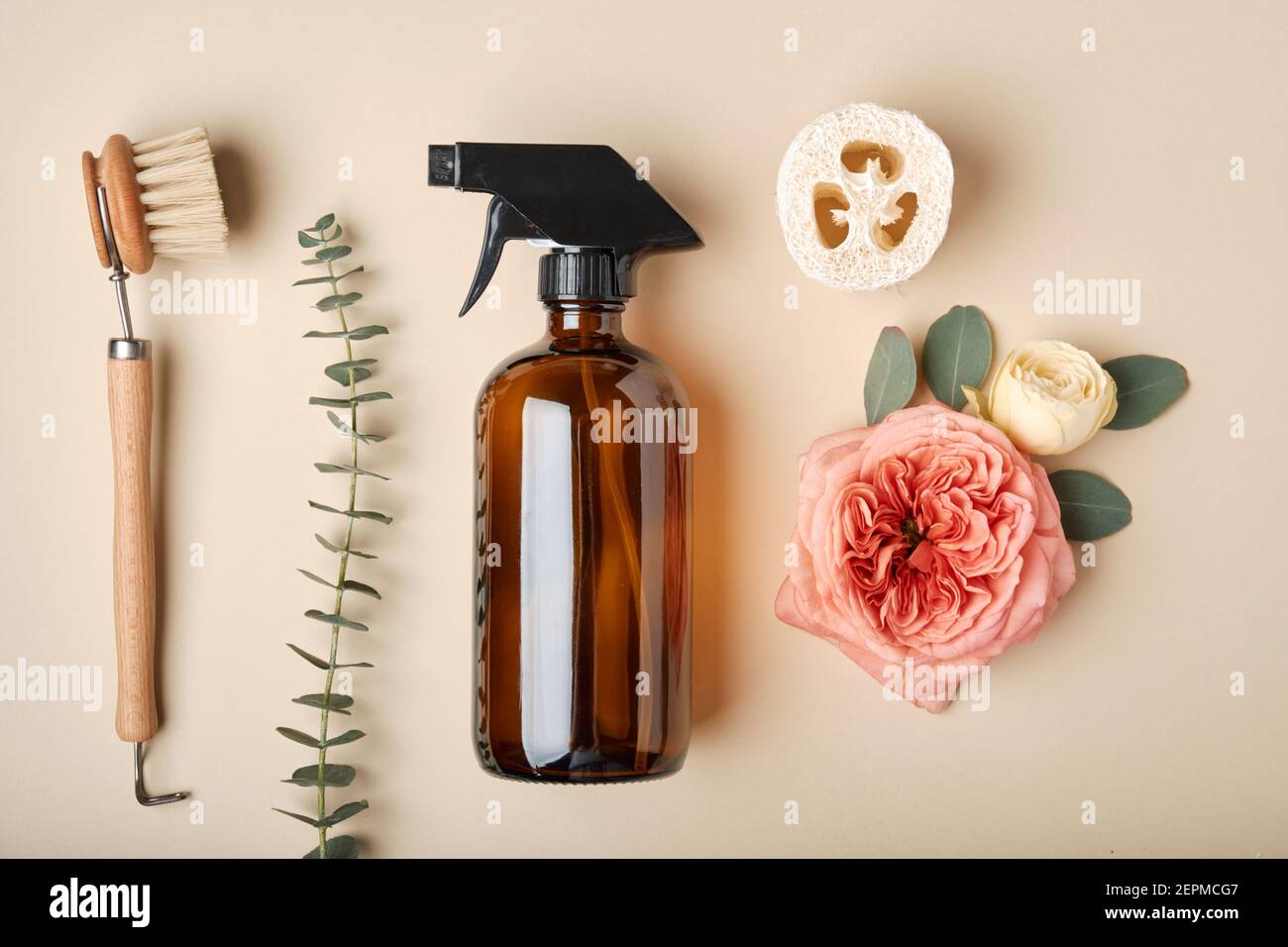 Dark amber glass pump cosmetic bottle and bath accessories Stock Photo