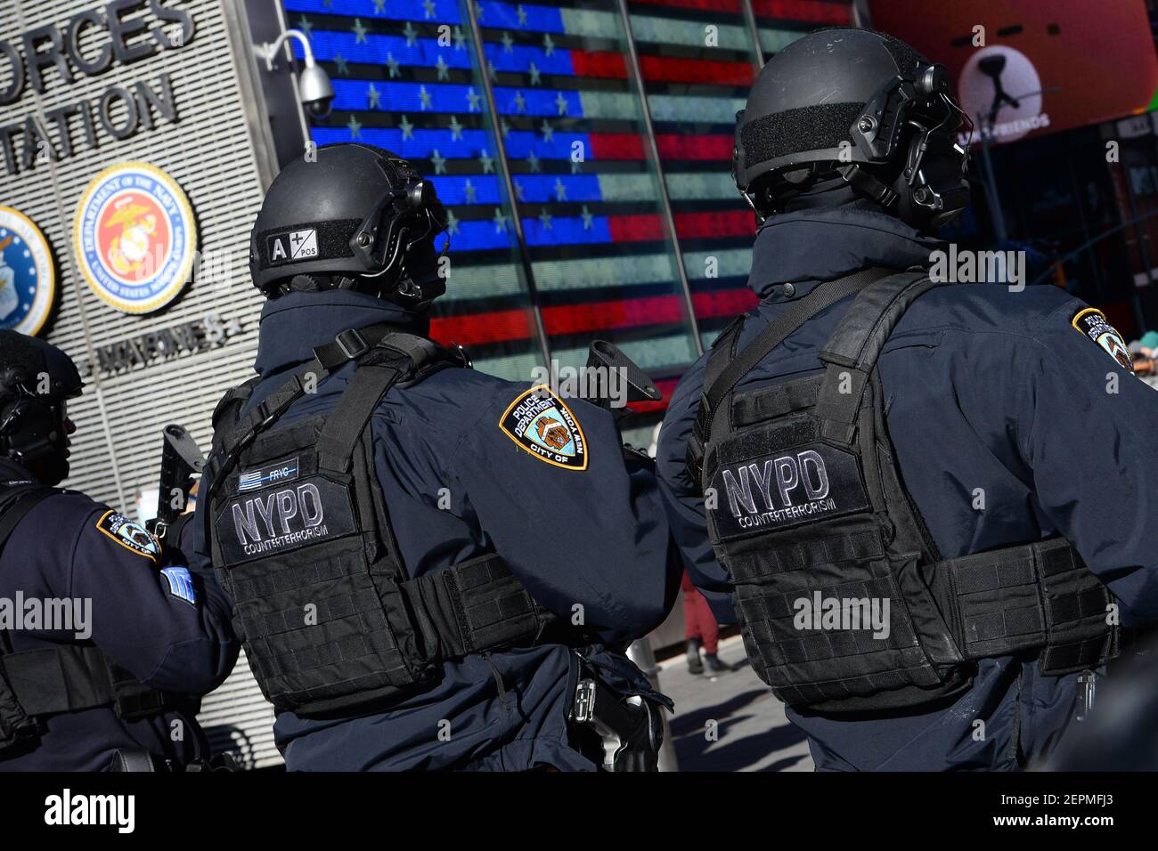 New York City Police officers patrol Times Square as New York City ...