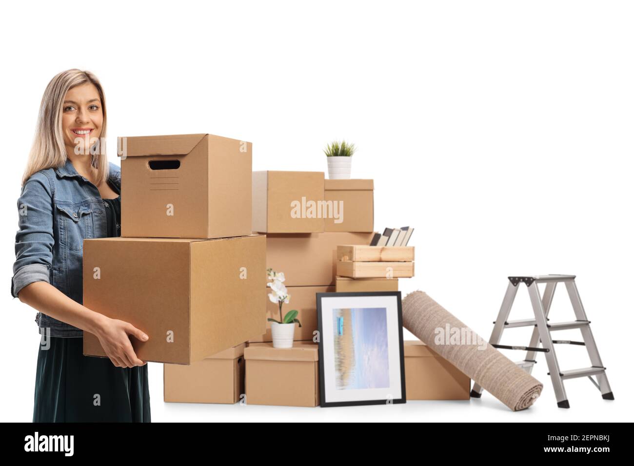 Young woman with packed cardboard boxes for home removal isolated on white background Stock Photo