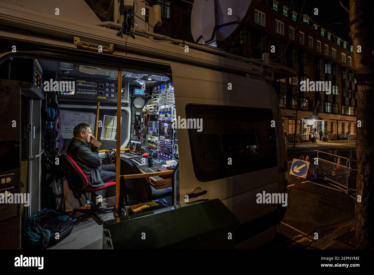 BBC Engineer works in a television production van outside King Edward VII's Hospital where HRH Prince Philip remains after feeling unwell, London UK Stock Photo