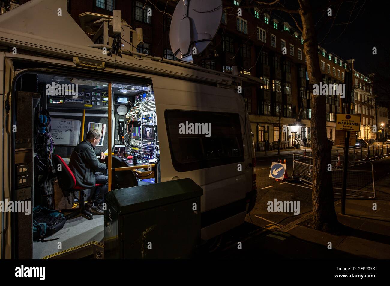 BBC Engineer works in a television production van outside King Edward VII's Hospital where HRH Prince Philip remains after feeling unwell, London UK Stock Photo