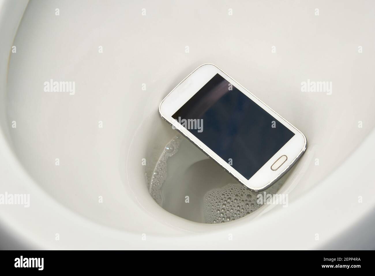 A smartphone accidentally fell into the toilet, but not drowned in