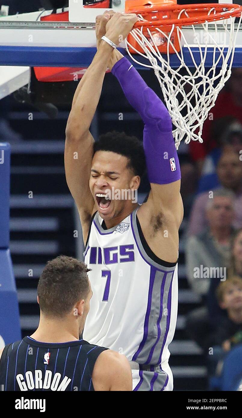 Sacramento Kings center Skal Labissiere (7) yells as he slam dunks over  Orlando Magic forward Aaron Gordon (bottom) on Tuesday, January 23, 2018 at  the Amway Center in Orlando, Fla. (Photo by