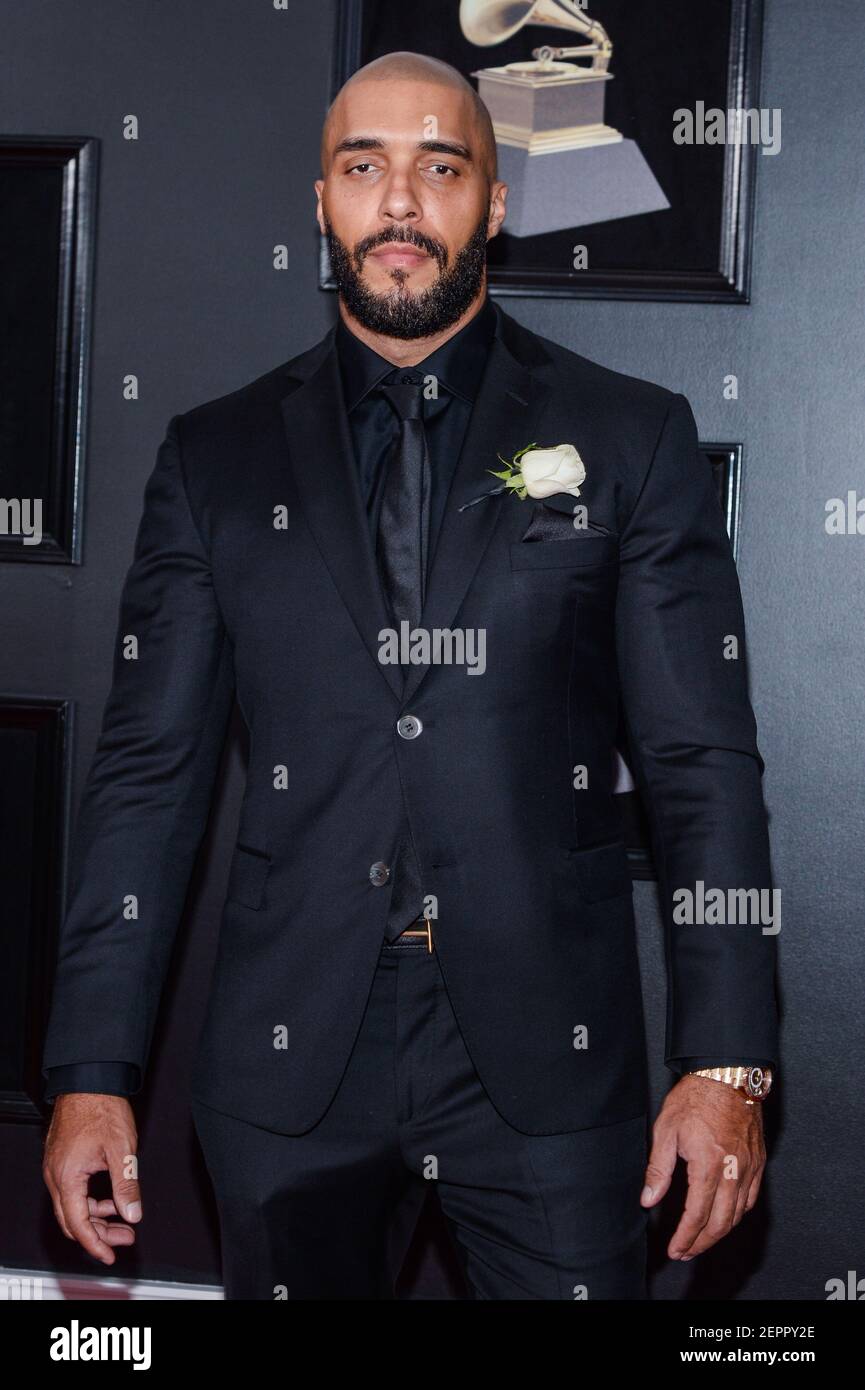 Jaycen Joshua arrives at the 60th Annual GRAMMY Awards red carpet at