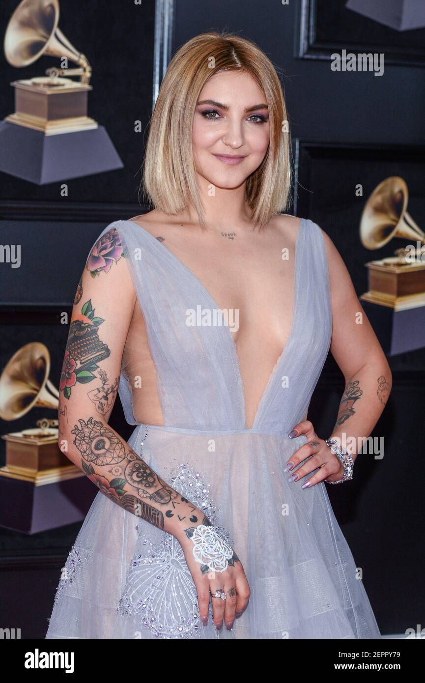 Julia Michaels arrives at the 60th Annual GRAMMY Awards red carpet at