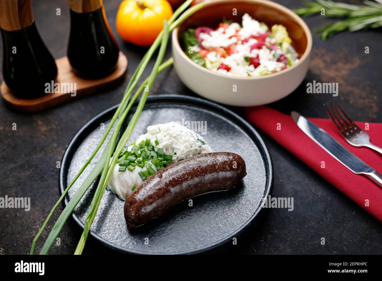 Black pudding, poached egg and cottage cheese Stock Photo Alamy