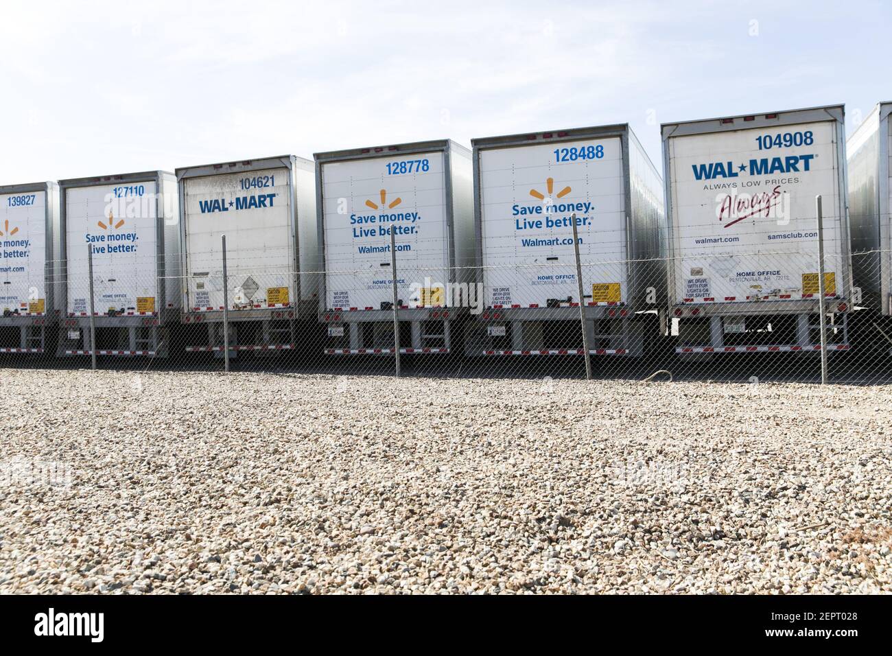 Walmart Inc., logos on a row of semitruck trailers in Phoenix, Arizona
