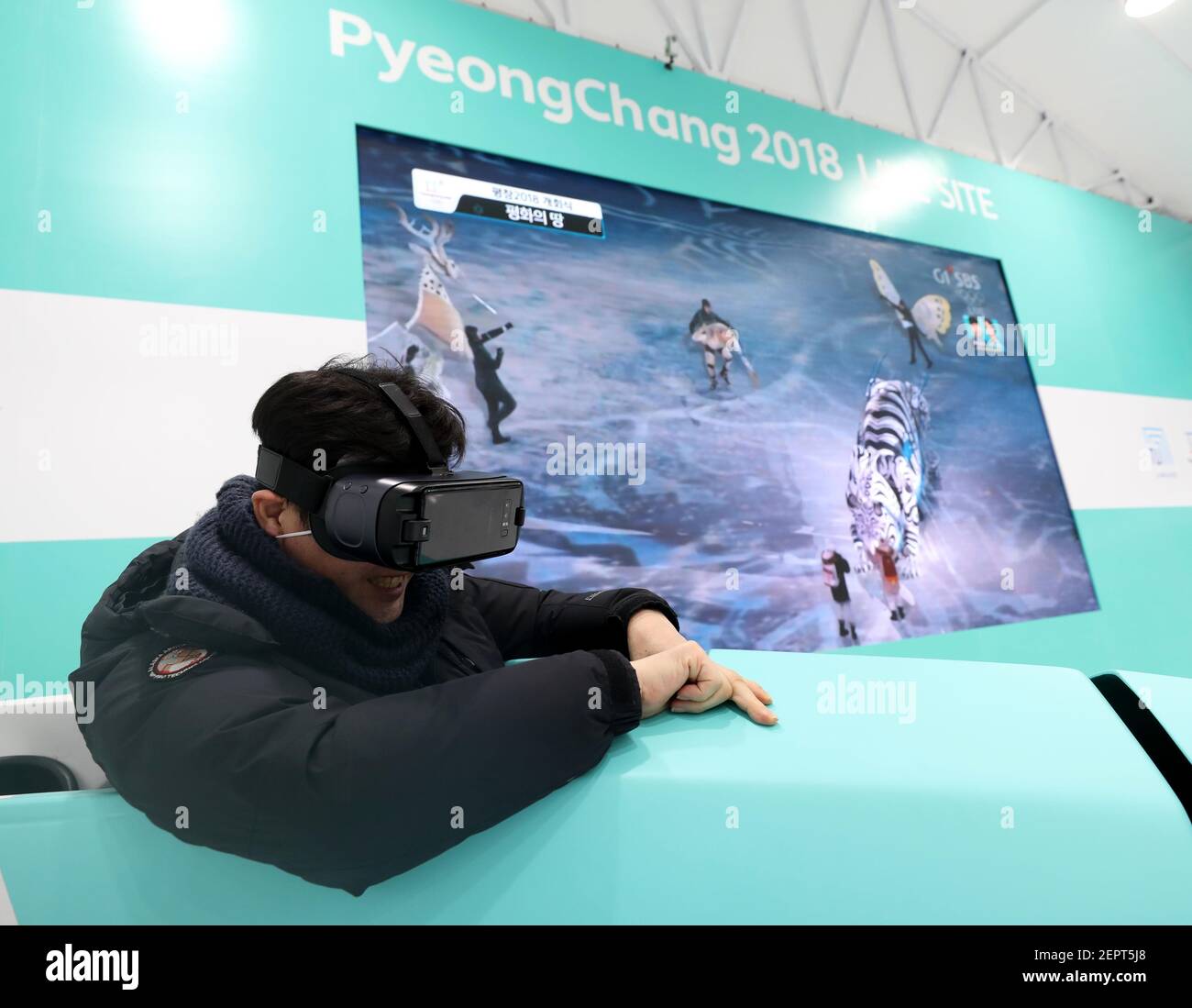 Feb 9, 2018; Seoul, South Korea; Several people took turns on a virtual  reality bobsled ride as the opening ceremony of the Pyeongchang 2018  Olympic Winter Games is played in the background