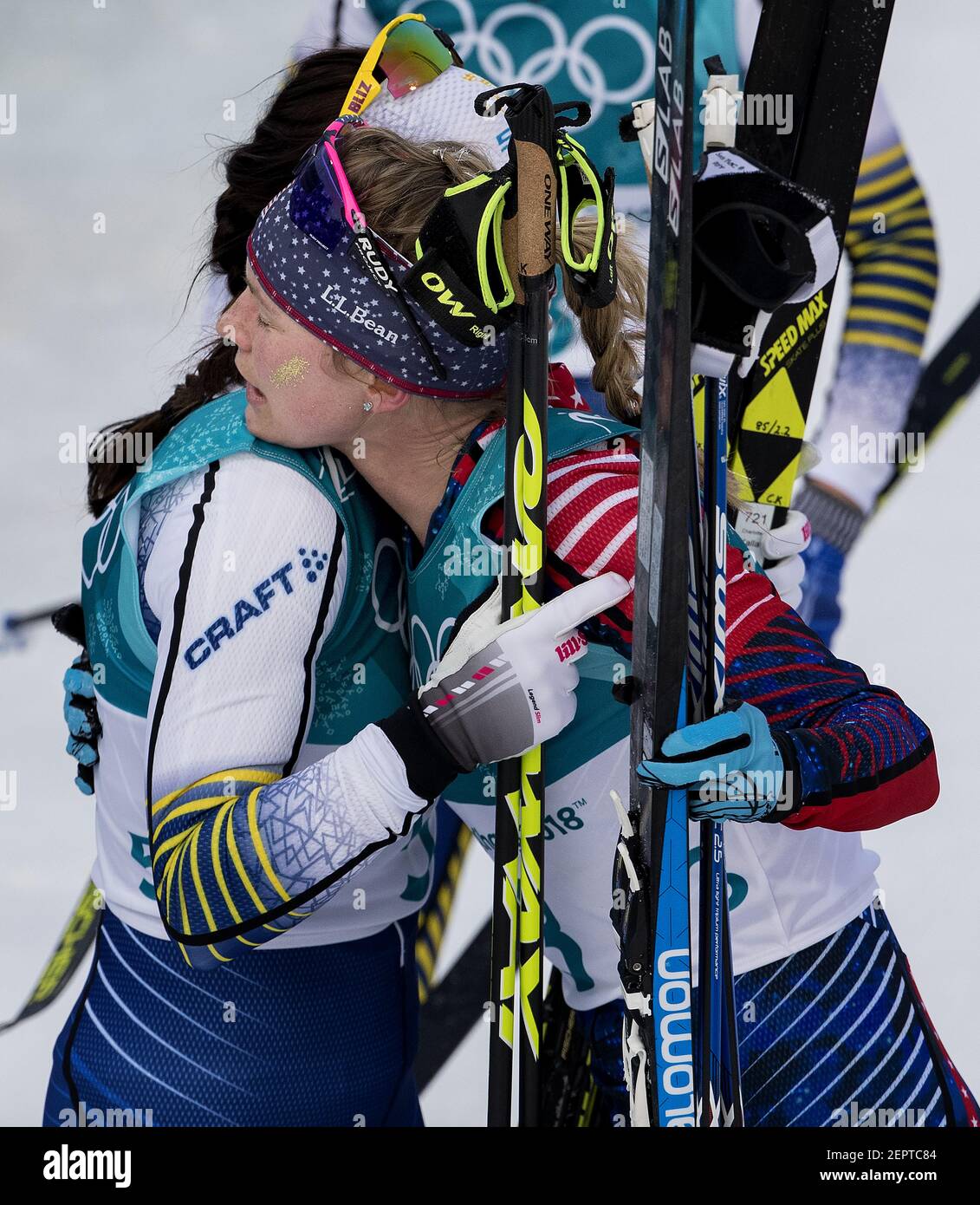 Jessie Diggins (3) from Afton, Minn., hugs winner Charlotte Kalla of Sweden at the end of the women's 7.5km + 7.5km Skiathlon at Alpensia Cross-Country Skiing Centre on Saturday, Feb. 10, 2018, at the Pyeongchang Winter Olympics. Diggins placed fifth in the event. (Photo by Carlos Gonzalez/Minneapolis Star Tribune/TNS/Sipa USA) Stock Photo