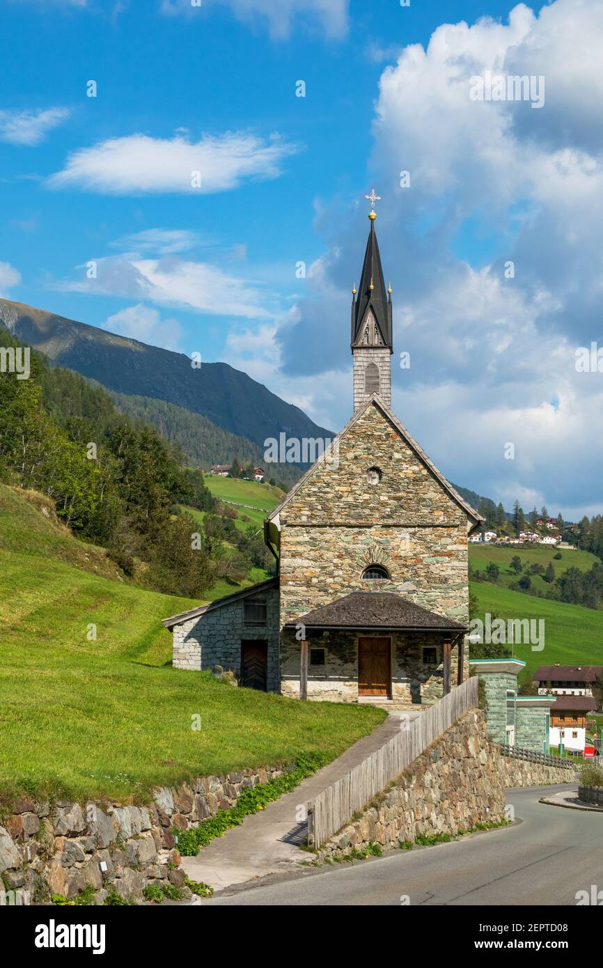 Sankt Crysanth und Sebastian church. Hinterbichl, Prägraten am Großvenediger. Austrian Alps. Europe. Stock Photo