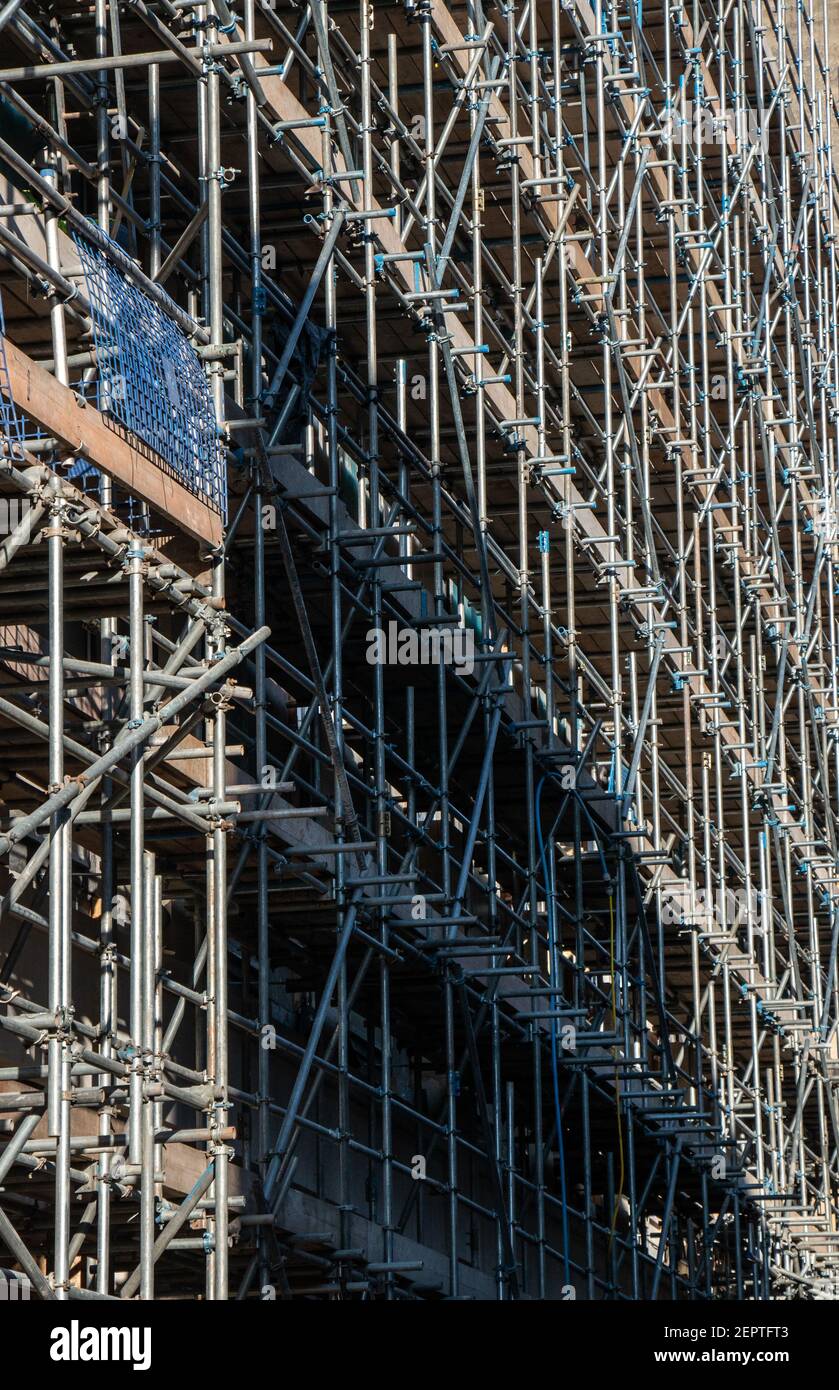Detail of extensive scaffolding around an Office block Stock Photo