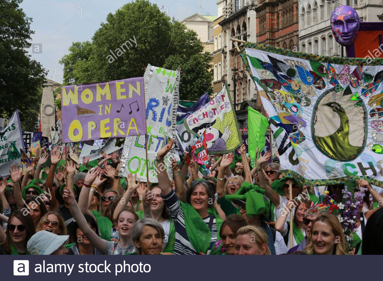 Suffragette supporters in London celebrate achieving the vote for women 100 years ago. Stock Photo