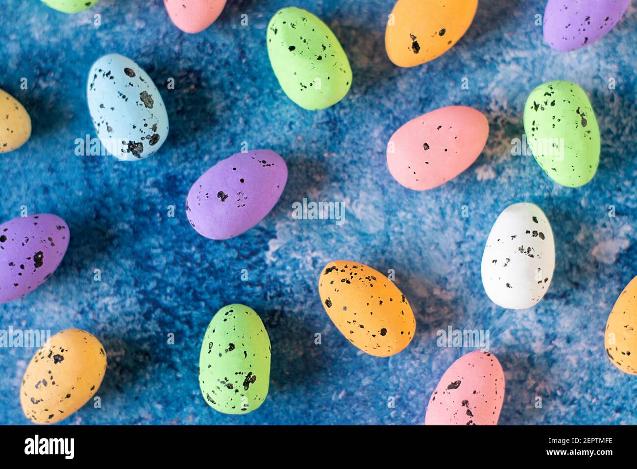 Colored easter eggs on a blue background Stock Photo