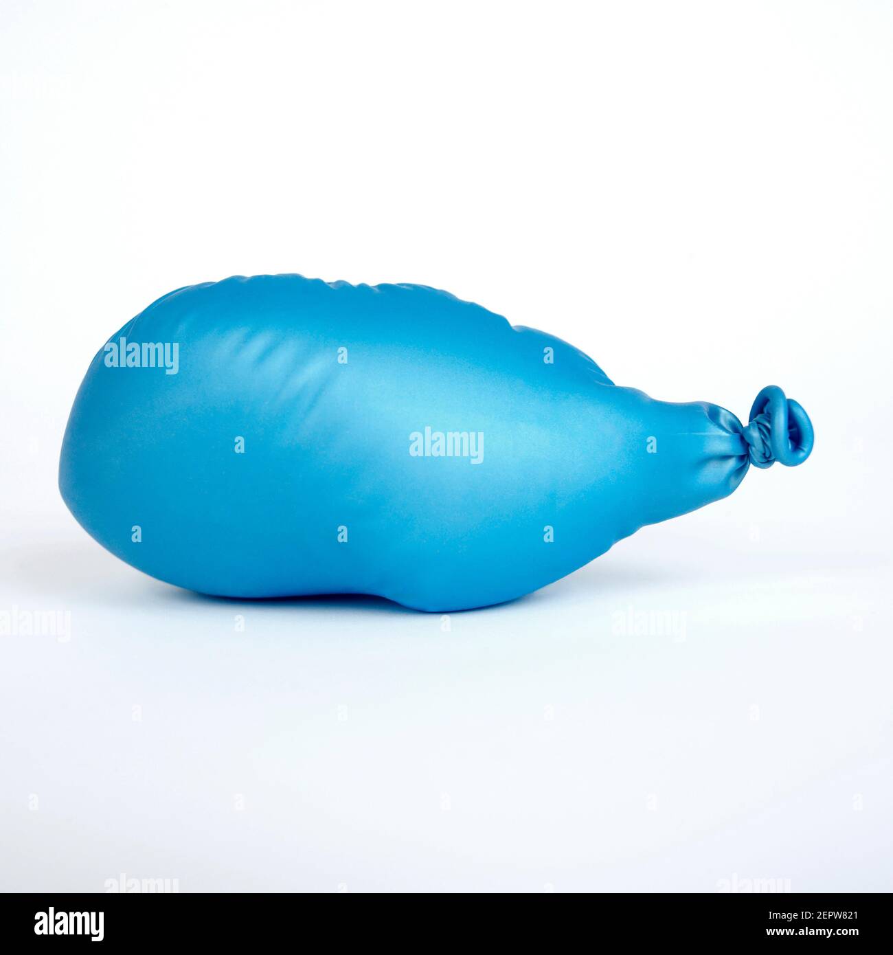Deflated blue balloons isolated on white background Stock Photo