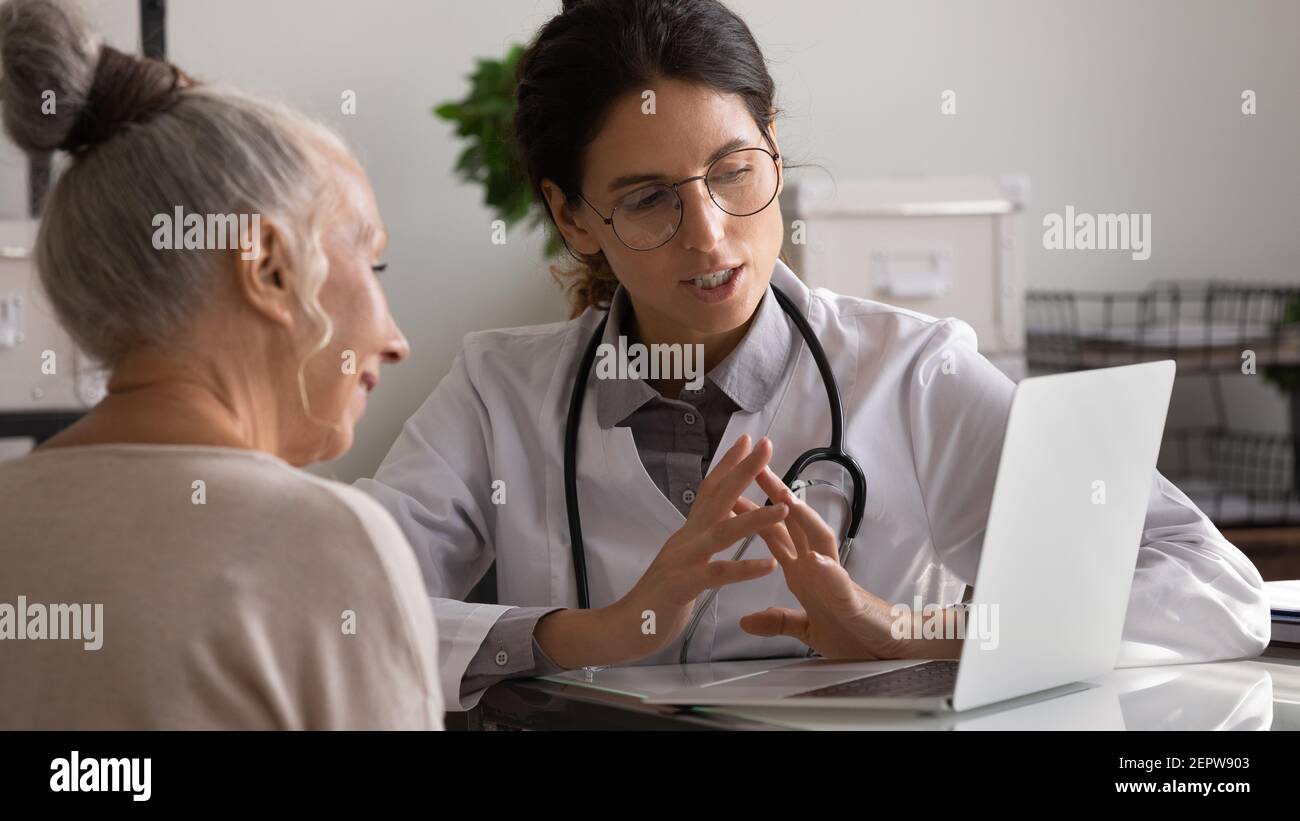 Doctor consulting with patient hi-res stock photography and images - Alamy