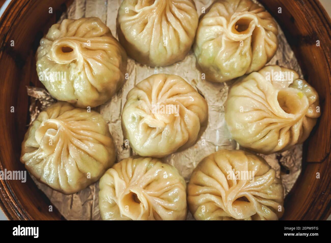 steamed dumplings in wooden basket Stock Photo Alamy