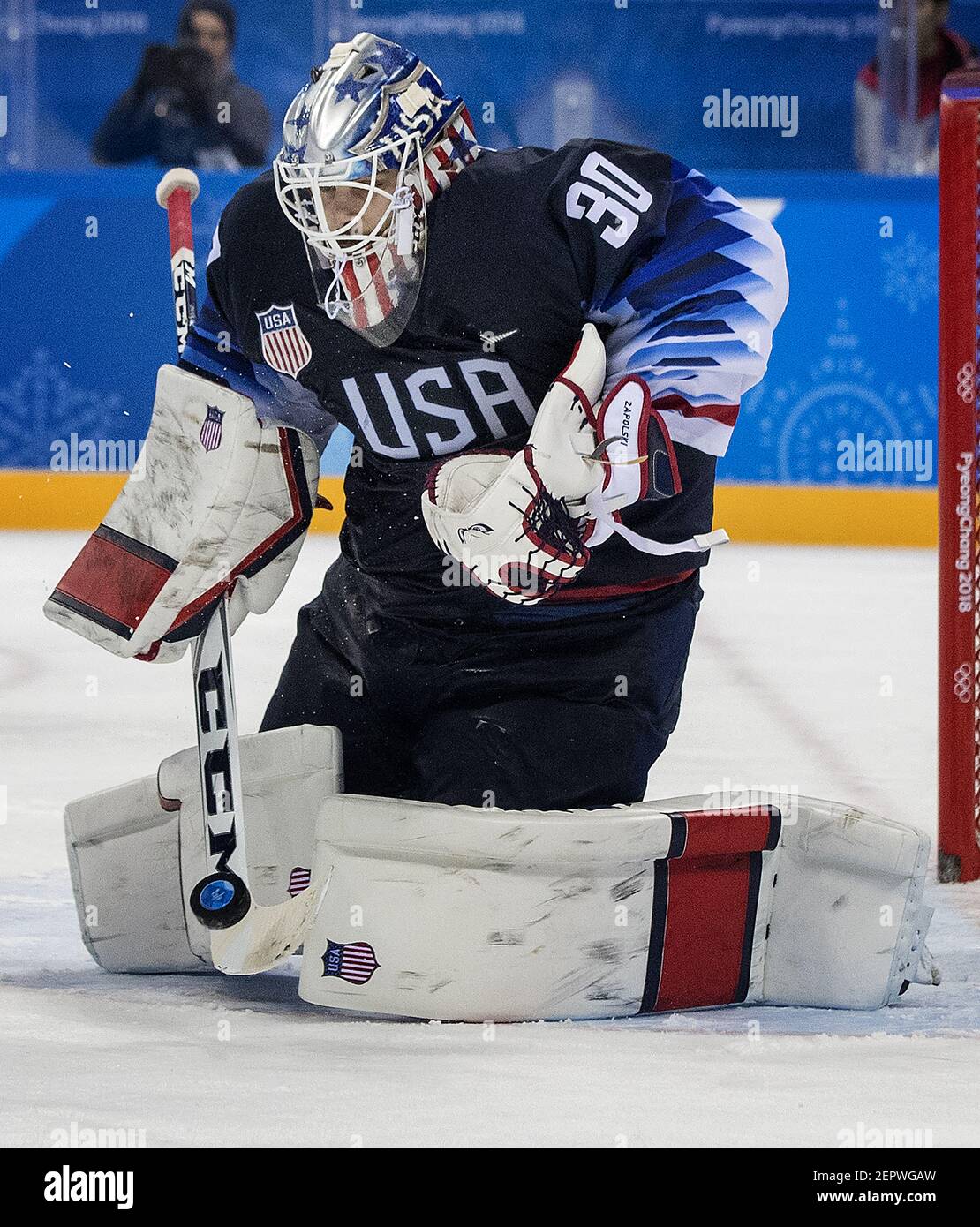 USA goalie Ryan Zapolski (30) makes a save in the second period against Slovakia during group play on Friday, Feb. 16, 2018, at South Korea's Gangneung Hockey Centre in the Pyeongchang Winter Olympics. (Photo by Carlos Gonzalez/Minneapolis Star Tribune/TNS/Sipa USA) Stock Photo