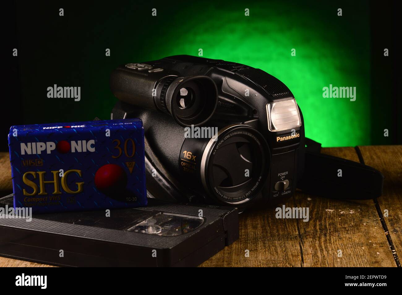 Old Panasonic camcorder movie camera with tapes nearby Stock Photo - Alamy